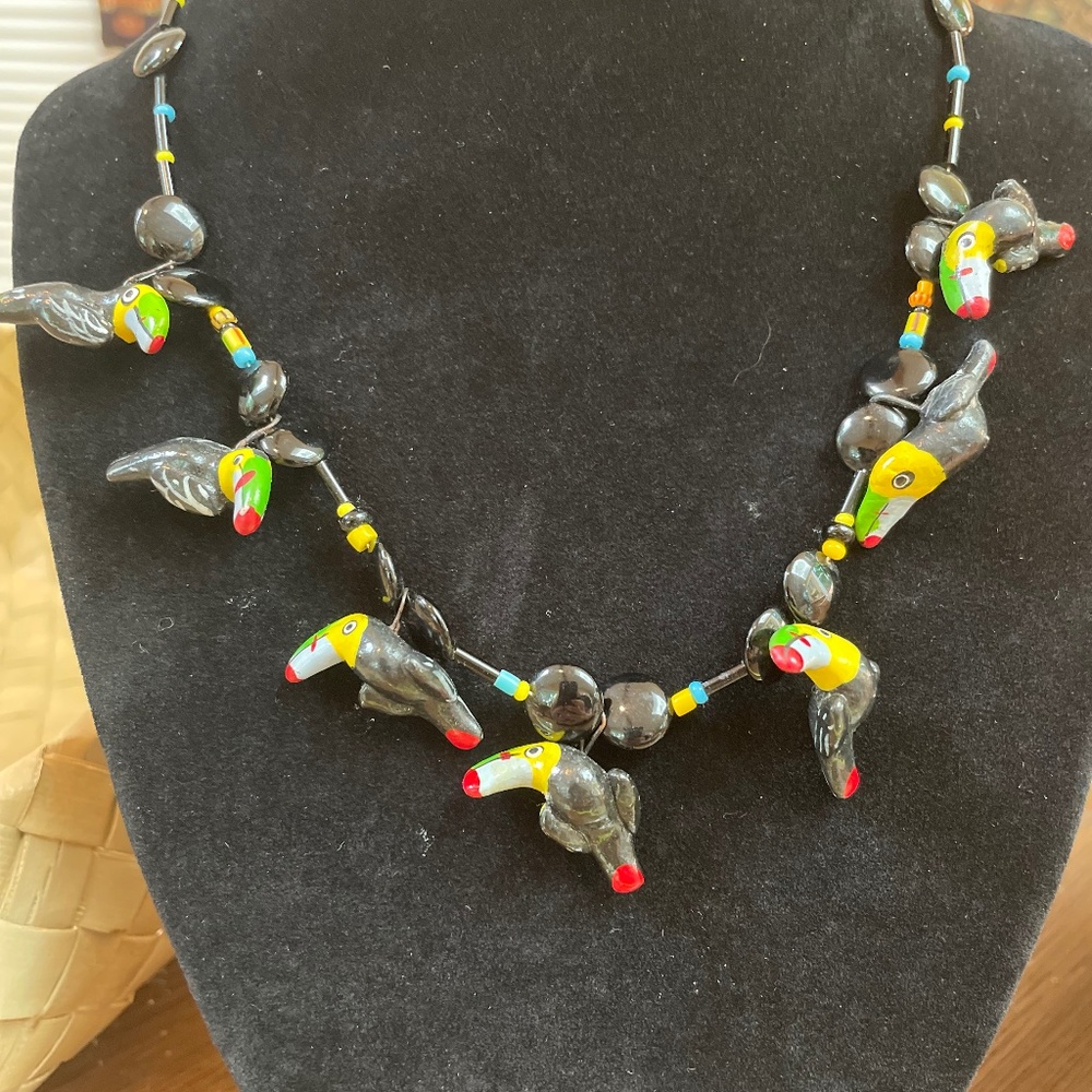 Whimsical Toucan beaded necklace with onyx beads. 16 inches long.